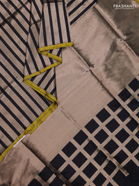 Banarasi tissue partly saree gold and black with plain body and piping border