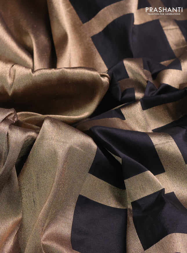 Banarasi tissue partly saree gold and black with plain body and piping border