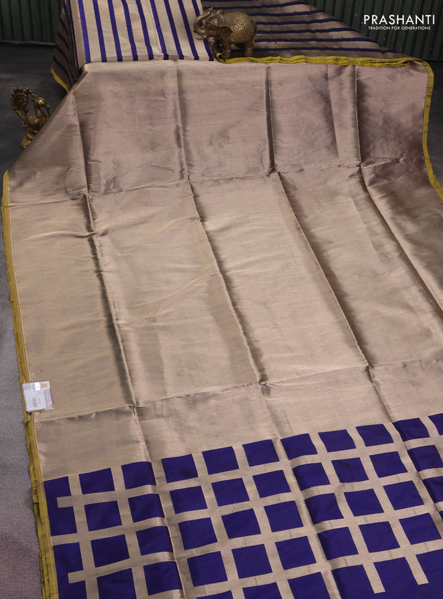 Banarasi tissue partly saree gold and navy blue with plain body and piping border