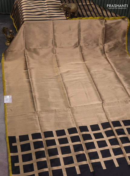 Banarasi tissue partly saree gold and black with plain body and piping border
