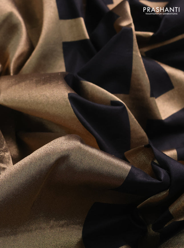 Banarasi tissue partly saree gold and black with plain body and piping border