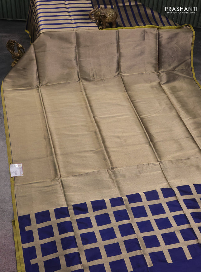 Banarasi tissue partly saree gold and navy blue with plain body and piping border