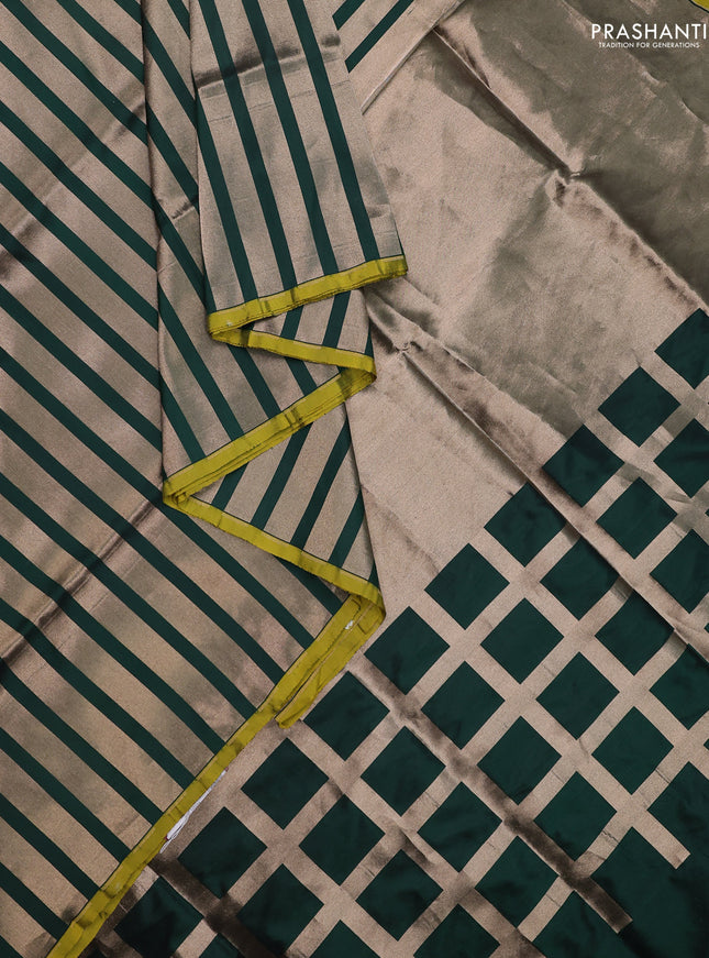 Banarasi tissue partly saree gold and green with plain body and piping border