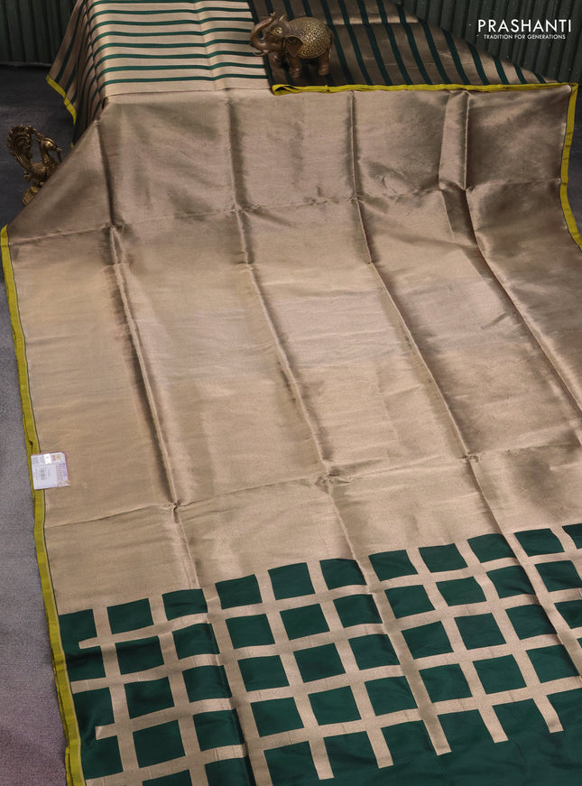 Banarasi tissue partly saree gold and green with plain body and piping border