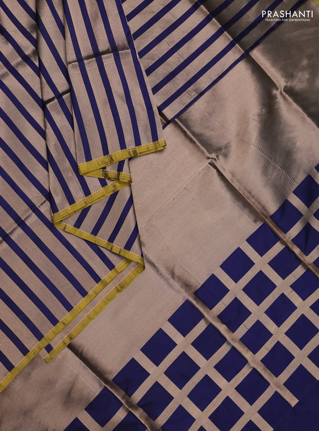 Banarasi tissue partly saree gold and navy blue with plain body and piping border