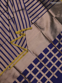 Banarasi tissue partly saree gold and navy blue with plain body and piping border