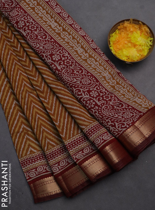 Semi maheshwari cotton saree dark mustard and maroon with allover ikat prints and zari woven border