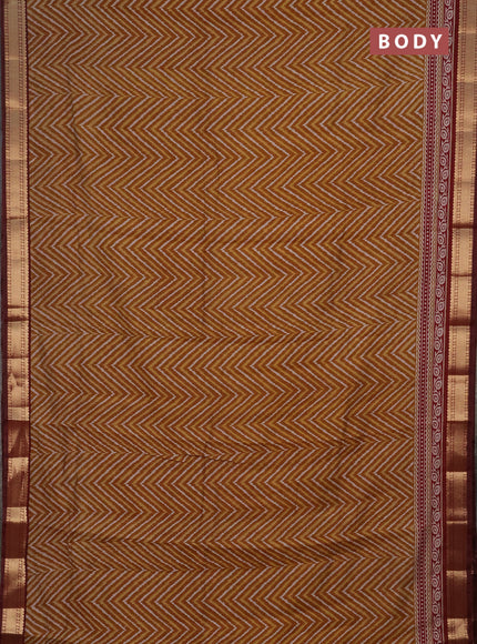 Semi maheshwari cotton saree dark mustard and maroon with allover ikat prints and zari woven border