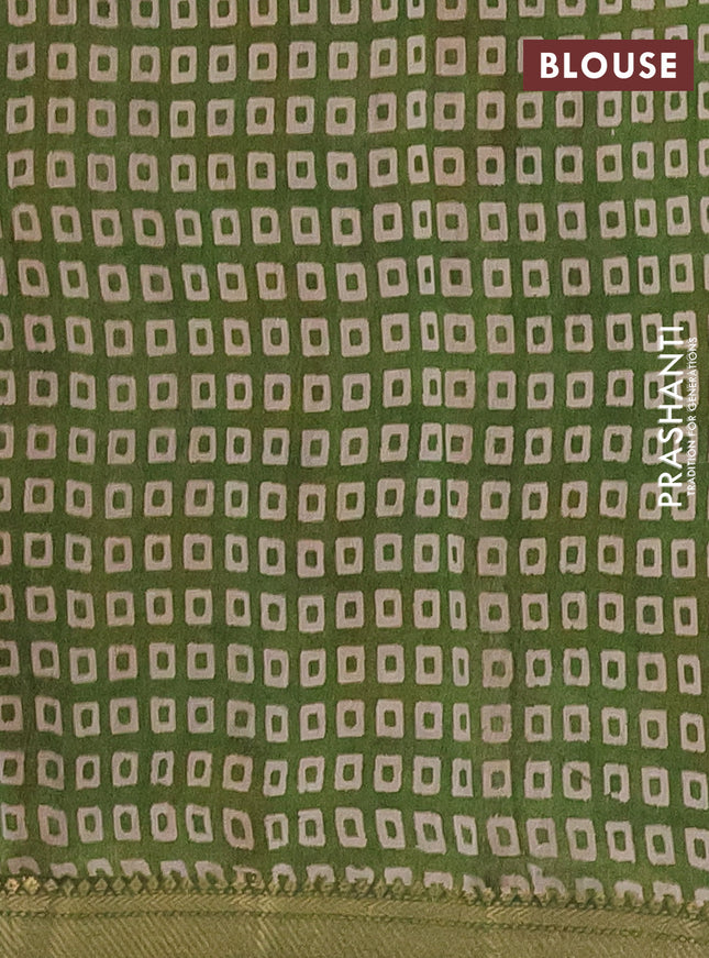 Semi maheshwari cotton saree beige and sap green with allover kalamkari prints and zari woven border