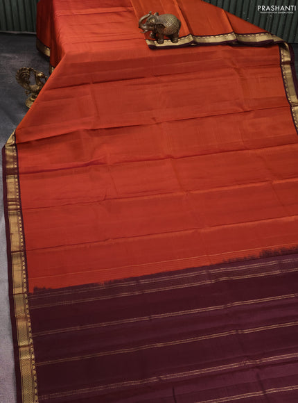 Pure kanchipuram silk saree rust shade and brown with plain body and zari woven border