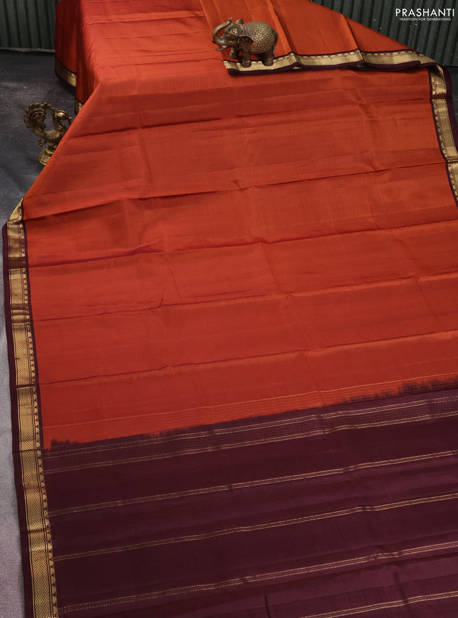 Pure kanchipuram silk saree rust shade and brown with plain body and zari woven border