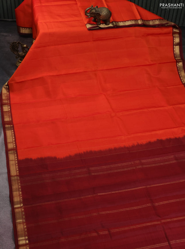 Pure kanchipuram silk saree orange and maroon with plain body and zari woven border