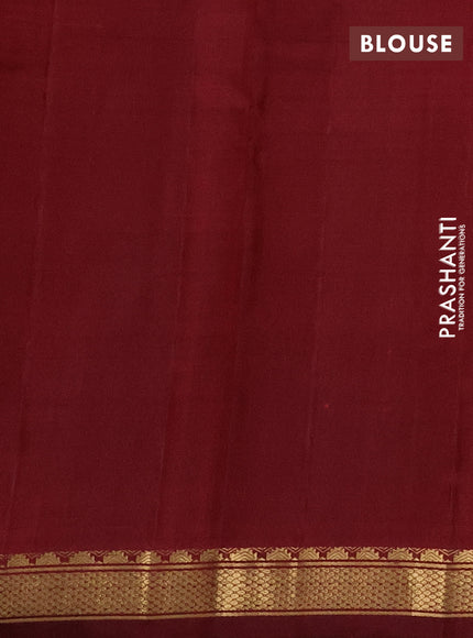 Pure kanchipuram silk saree orange and maroon with plain body and zari woven border