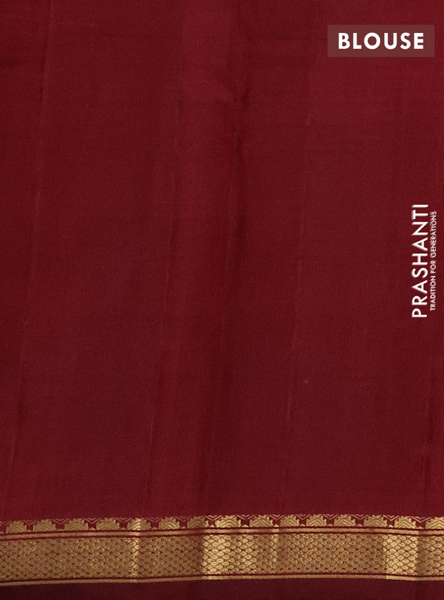 Pure kanchipuram silk saree orange and maroon with plain body and zari woven border