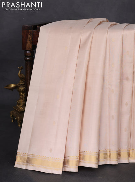 Pure kanchipuram silk saree cream with zari woven buttas and zari woven border