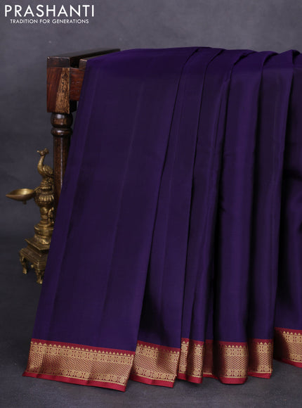 Pure kanchipuram silk saree navy blue and maroon with plain body and zari woven border