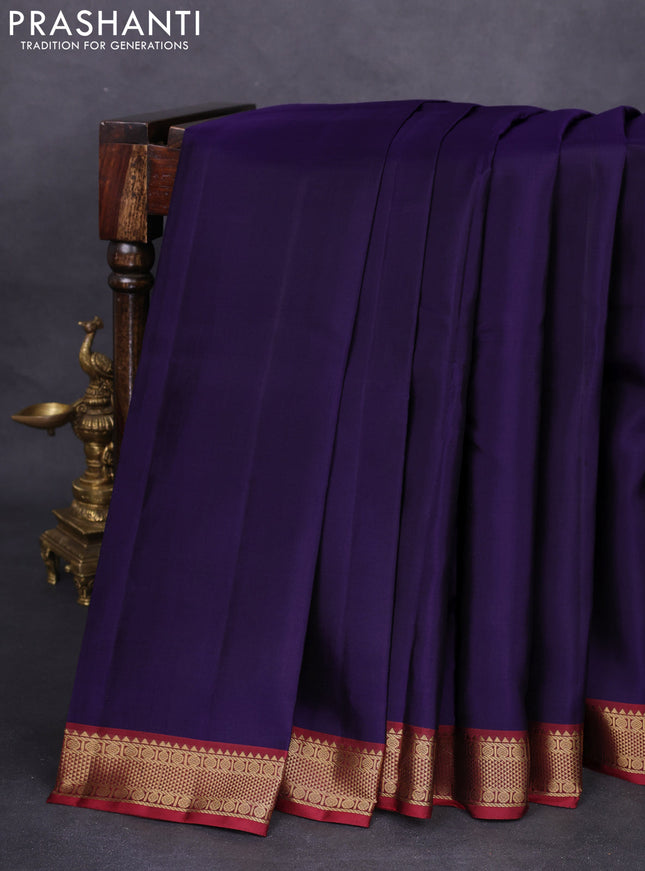 Pure kanchipuram silk saree navy blue and maroon with plain body and zari woven border