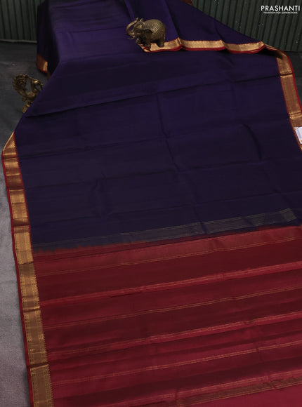 Pure kanchipuram silk saree navy blue and maroon with plain body and zari woven border