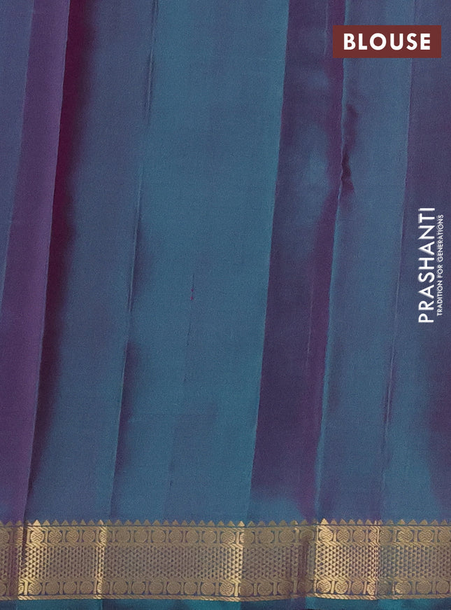 Pure kanchipuram silk saree pastel pink and peacock green with plain body and zari woven border