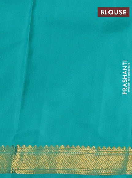 Pure kanchipuram silk saree black and teal green with zari woven buttas and zari woven border