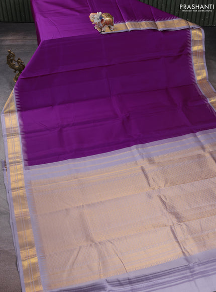 Pure kanchipuram silk saree purple and pastel grey with plain body and temple design zari woven border