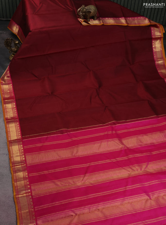 Pure kanchipuram silk saree maroon and pink with plain body and zari woven korvai border
