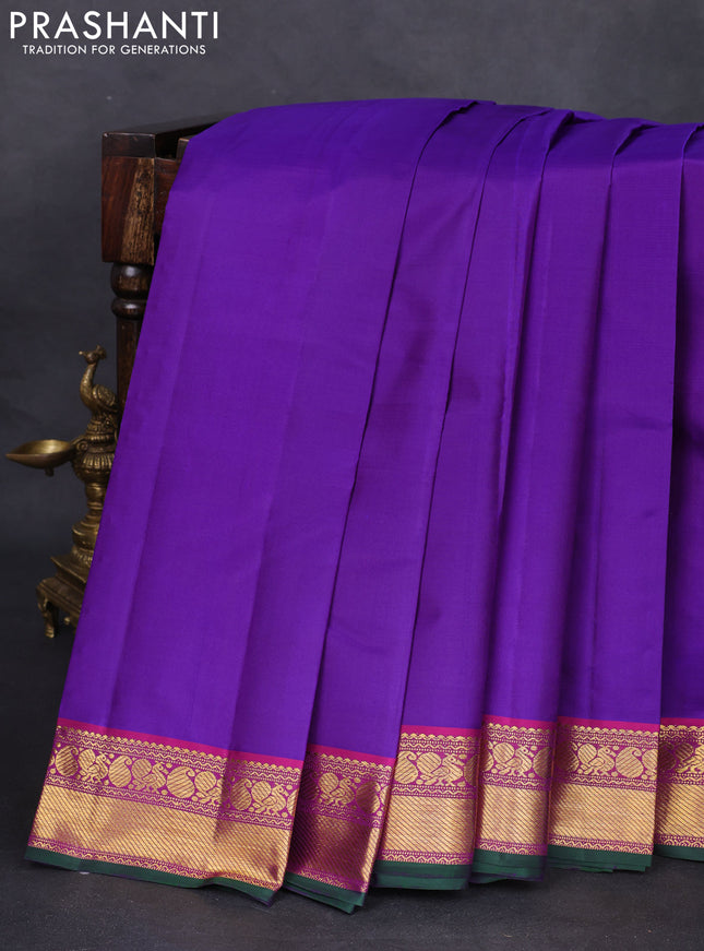 Pure kanchipuram silk saree violet and purple with plain body and zari woven korvai border