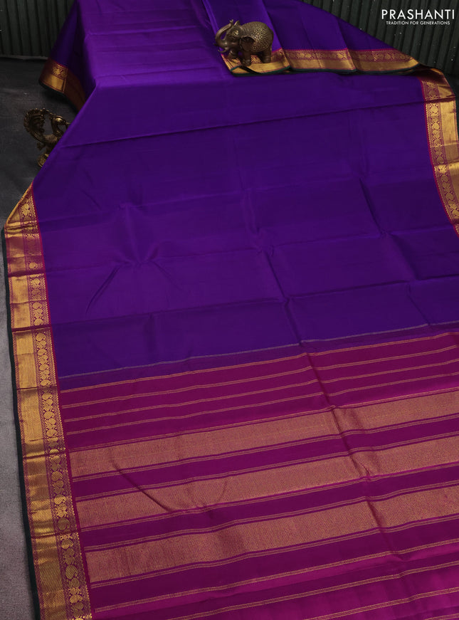 Pure kanchipuram silk saree violet and purple with plain body and zari woven korvai border
