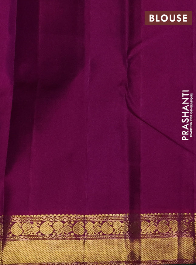 Pure kanchipuram silk saree violet and purple with plain body and zari woven korvai border