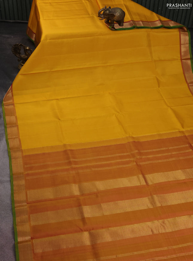 Pure kanchipuram silk saree yellow and dual shade of pink with plain body and zari woven border