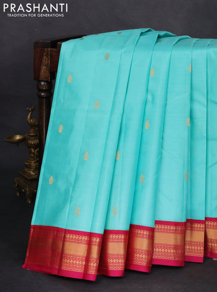 Pure kanchipuram silk saree teal blue and pink with zari woven buttas and zari woven korvai border