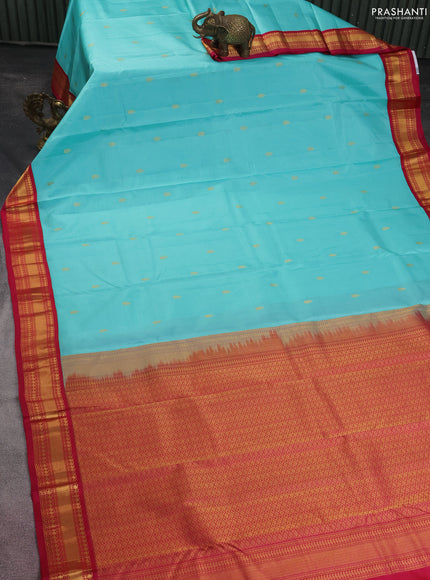 Pure kanchipuram silk saree teal blue and pink with zari woven buttas and zari woven korvai border