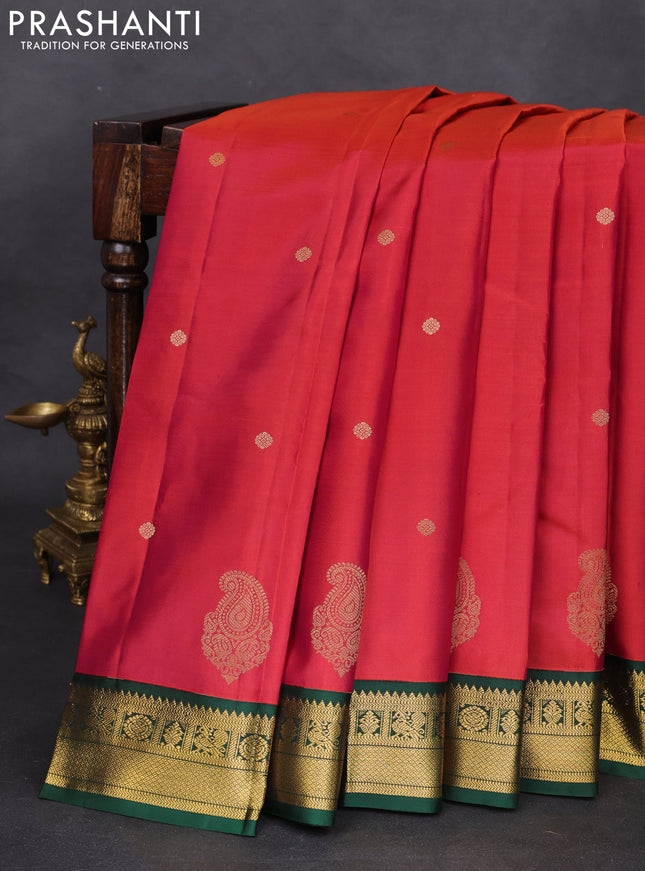 Pure kanchipuram silk saree dual shade of pinkish orange and green with zari woven buttas and zari woven korvai border