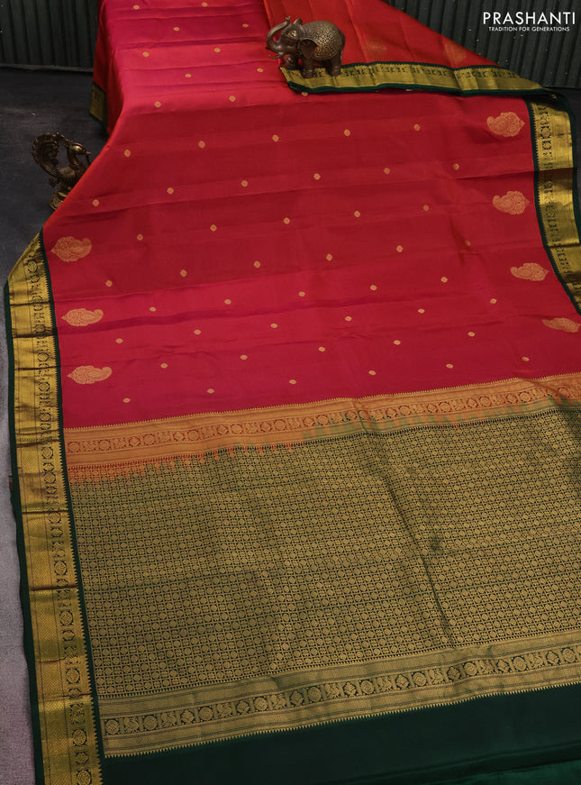 Pure kanchipuram silk saree dual shade of pinkish orange and green with zari woven buttas and zari woven korvai border