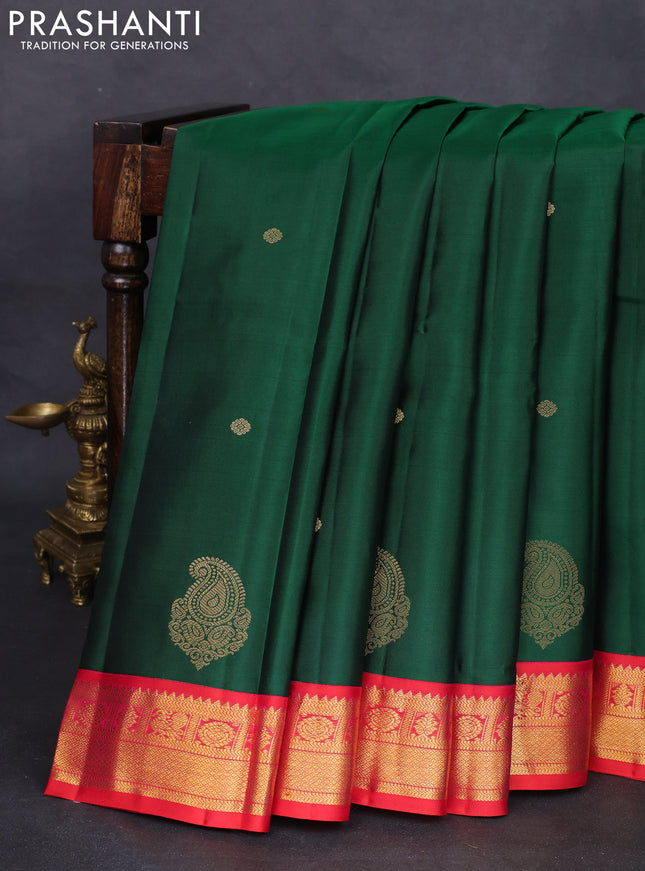 Pure kanchipuram silk saree green and dual shade of pinkish orange with zari woven buttas and zari woven korvai border
