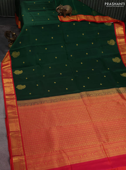 Pure kanchipuram silk saree green and dual shade of pinkish orange with zari woven buttas and zari woven korvai border