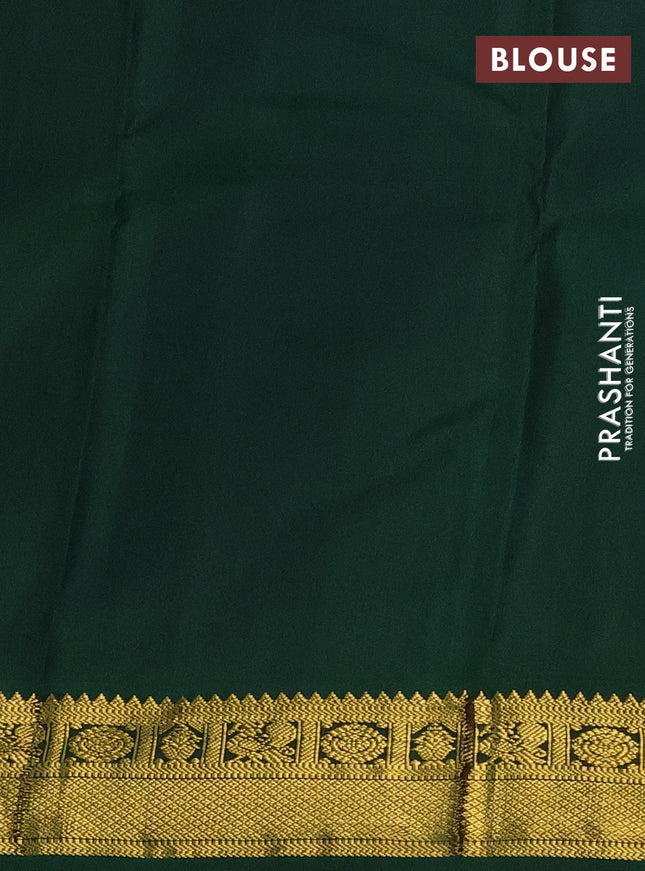 Pure kanchipuram silk saree dual shade of pinkish orange and dark green with zari woven buttas and zari woven korvai border