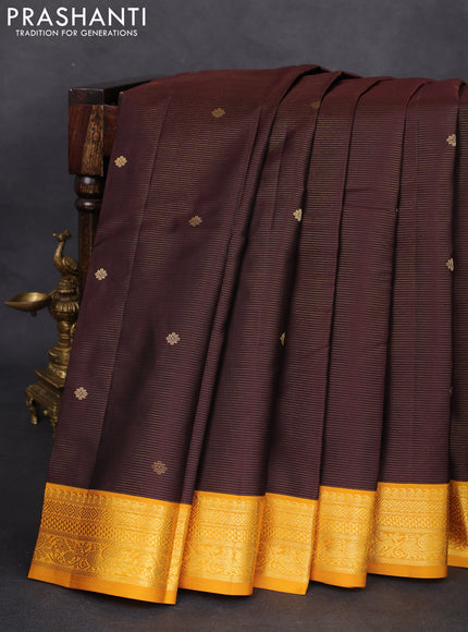 Pure kanchipuram silk saree brown and mustard yellow with allover zari weaves & buttas and zari woven korvai border