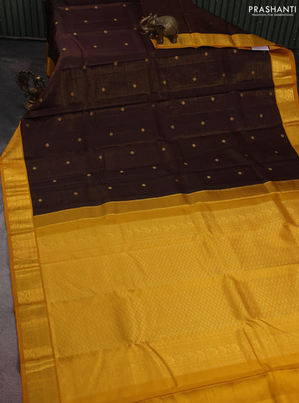 Pure kanchipuram silk saree brown and mustard yellow with allover zari weaves & buttas and zari woven korvai border