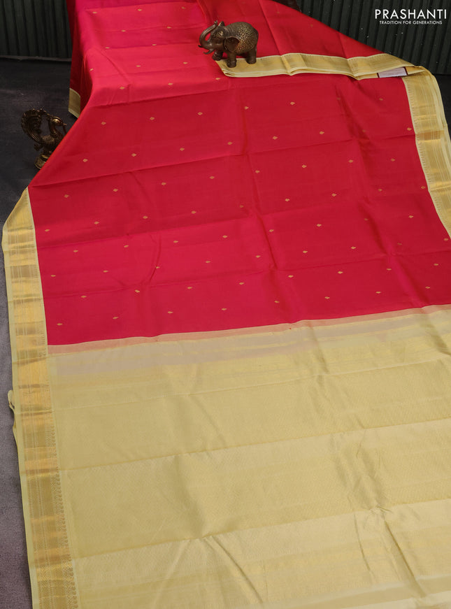 Pure kanchipuram silk saree reddish pink and pale yellow with zari woven buttas and zari woven korvai border