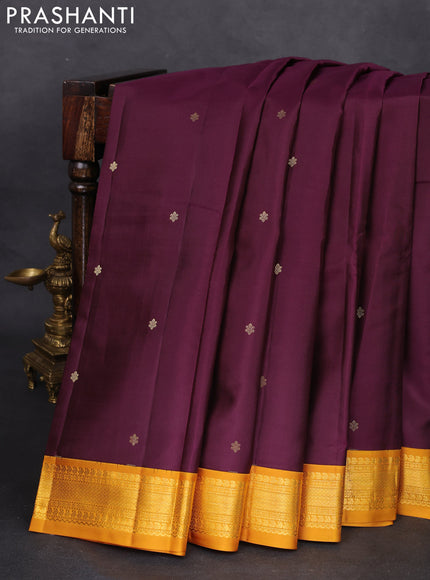 Pure kanchipuram silk saree wine shade and mustard yellow with zari woven buttas and zari woven korvai border