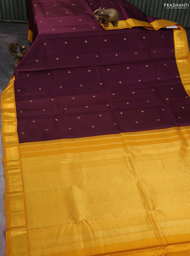 Pure kanchipuram silk saree wine shade and mustard yellow with zari woven buttas and zari woven korvai border