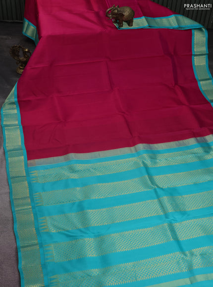 Pure kanchipuram silk saree pink and teal blue with plain body and zari woven korvai border