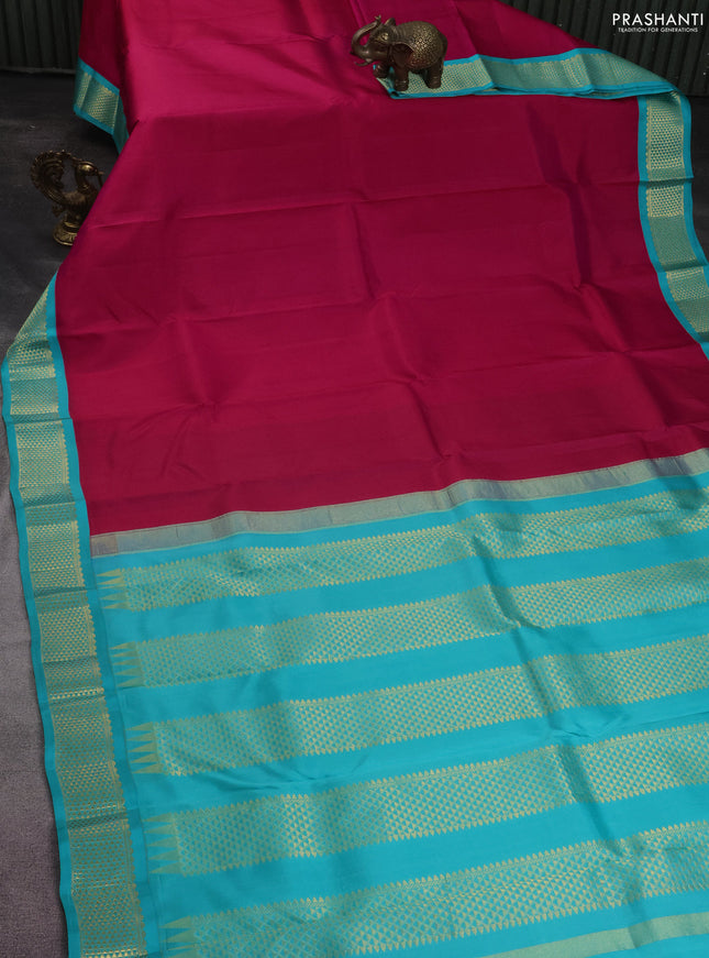 Pure kanchipuram silk saree pink and teal blue with plain body and zari woven korvai border