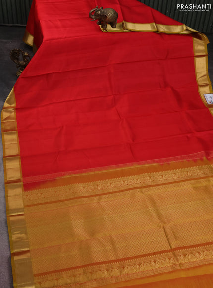 Pure kanchipuram silk saree red and mustard shade with plain body and zari woven border