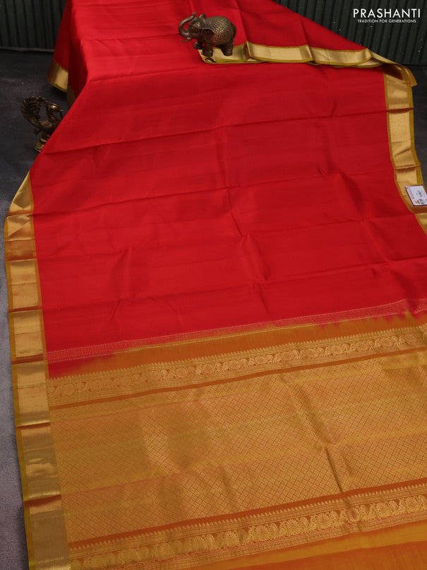 Pure kanchipuram silk saree red and mustard shade with plain body and zari woven border