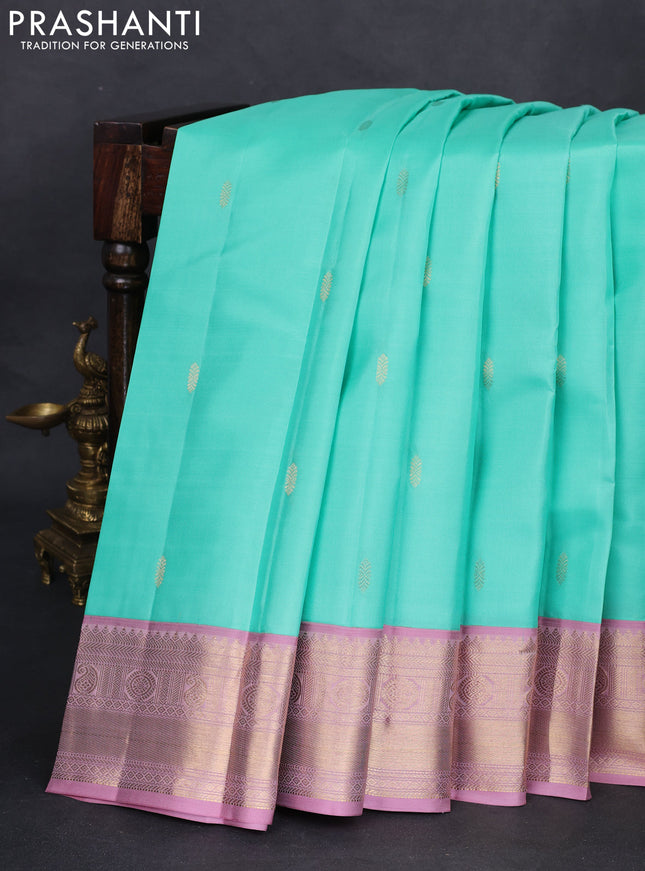 Pure kanchipuram silk saree teal green and pastel pink with zari woven buttas and zari woven border