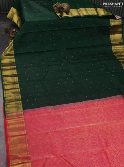 Pure kanchipuram silk saree dark green and dual shade of pinkish orange with zari woven buttas and zari woven border