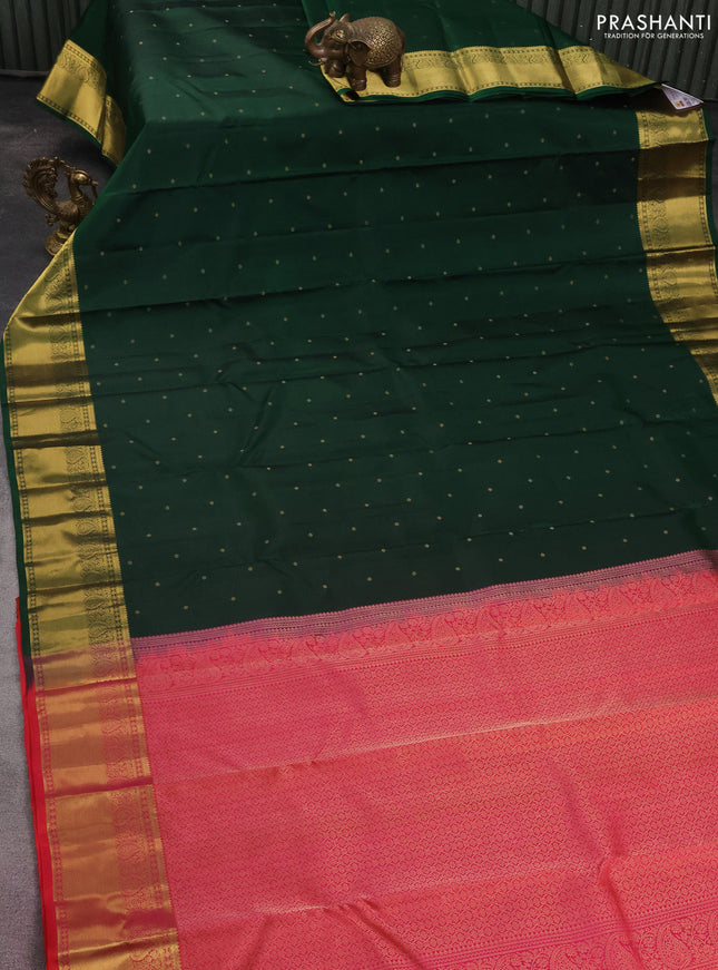 Pure kanchipuram silk saree dark green and dual shade of pinkish orange with zari woven buttas and zari woven border