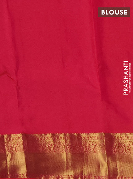 Pure kanchipuram silk saree dark green and dual shade of pinkish orange with zari woven buttas and zari woven border